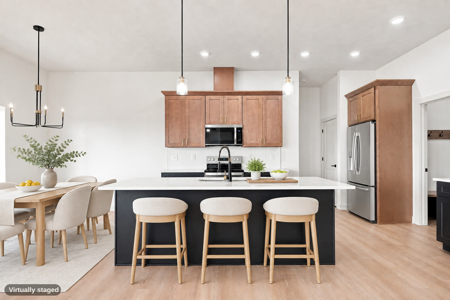 Same kitchen and dining area, virtually staged.